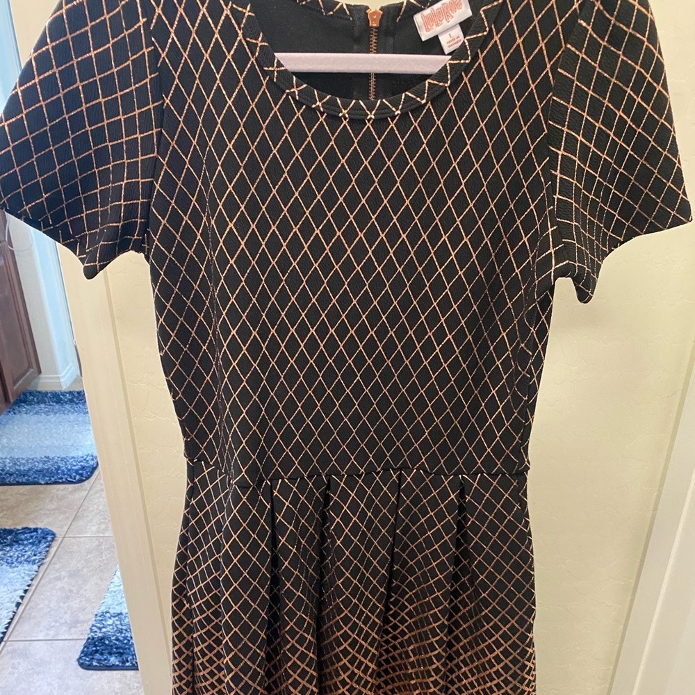 3 Amelia LulaRoe Elegant dresses. All size large. Good used condition.